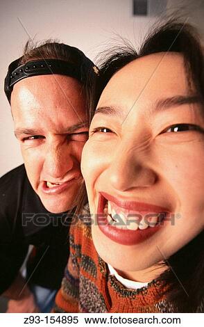 Stock Photography - Playful couple. Fotosearch
