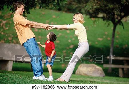 Playful family View Large Photo Image Stock Photograph - Playful family. Fotosearch