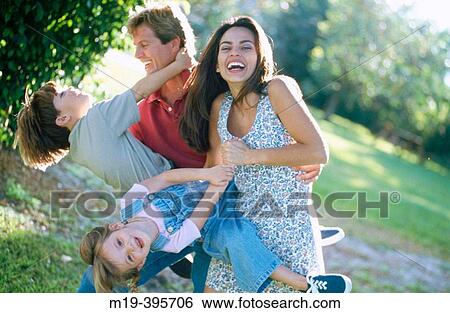 playful family View Large Photo Image Stock Photograph - playful family. Fotosearch