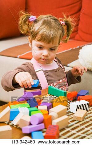 Playful toddler girl View Large Photo Image Stock Image - Playful toddler girl. Fotosearch