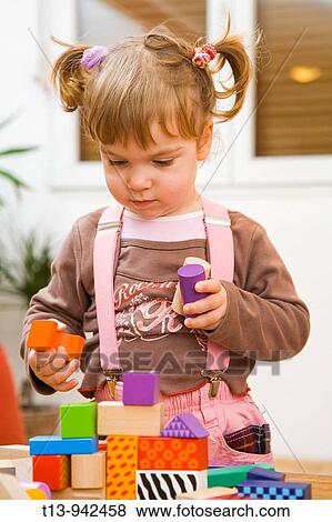 Playful toddler girl View Large Photo Image Stock Photo - Playful toddler girl. Fotosearch