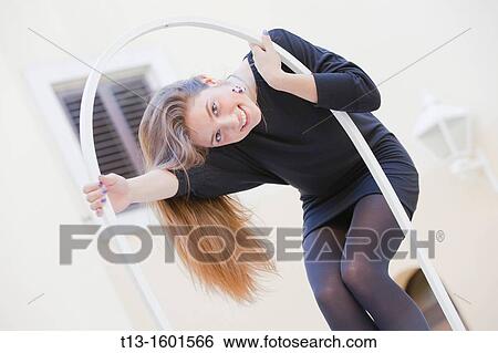 Playful young woman View Large Photo Image Stock Photograph - Playful young woman. Fotosearch