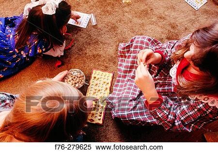 Playing bingo at 7th birthday party View Large Photo Image Stock Photography - Playing bingo at 7th birthday party. Fotosearch