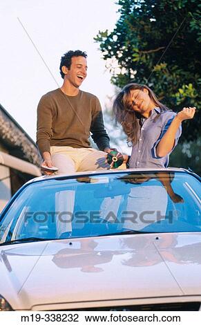 playing CDs in a car and dancing View Large Photo Image Stock Image - playing CDs in a car and dancing. Fotosearch