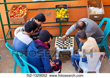 Playing chess, Ajloun Valley, Jordan, Middle East. View Large Photo Image Stock Image - Playing chess, Ajloun Valley, Jordan, Middle East.. Fotosearch