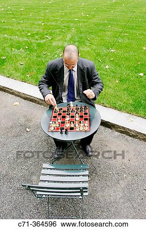Playing chess View Large Photo Image Stock Photograph - Playing chess. Fotosearch