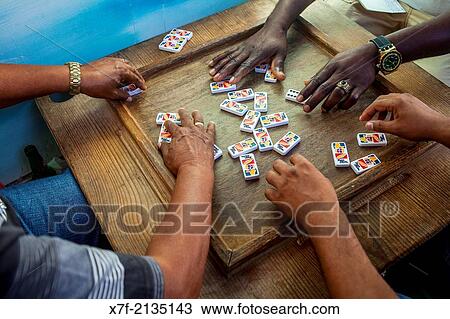 playing domino, Bibijagua beach, Punta Cana, Dominican Republic. View Large Photo Image Stock Image - playing domino, Bibijagua beach, Punta Cana, Dominican Republic.. Fotosearch