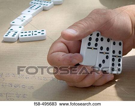 Playing domino View Large Photo Image Stock Image - Playing domino. Fotosearch