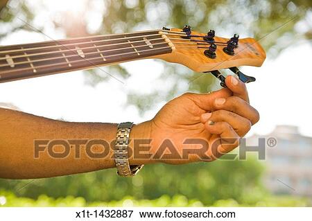 Playing guitar. View Large Photo Image Stock Photo - Playing guitar.. Fotosearch