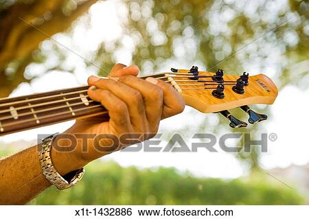 Playing guitar. View Large Photo Image Stock Photograph - Playing guitar.. Fotosearch