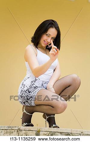 Playing threat with a finger pretty young woman View Large Photo Image Stock Photo - Playing threat with a finger pretty young woman. Fotosearch