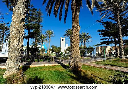 Plaza Espaa and the old colonial church. Sidi Ifni. Morocco. North Africa. View Large Photo Image Stock Photo - Plaza Espaa and the old colonial church. Sidi Ifni. Morocco. North Africa.. Fotosearch