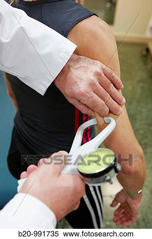 Plicometer, measuring the body fatet, cardiac stress test, sports medicine. Hospital Policlinica Gipuzkoa, San Sebastian, Donostia, Euskadi, Spain View Large Photo Image Stock Photography - Plicometer, measuring the body fatet, cardiac stress test, sports medicine. Hospital Policlinica Gipuzkoa, San Sebastian, Donostia, Euskadi, Spain. Fotosearch