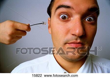 Plug in the ear View Large Photo Image Stock Image - Plug in the ear. Fotosearch