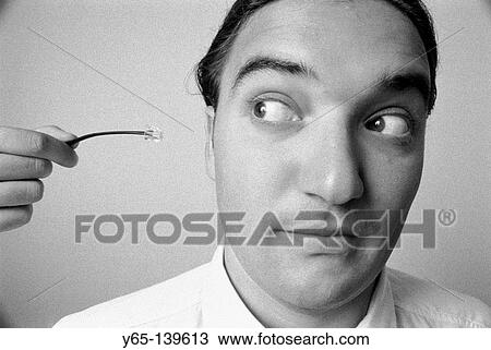 Plug in the ear View Large Photo Image Stock Image - Plug in the ear. Fotosearch