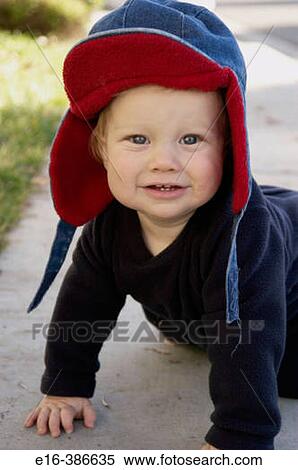 podrtrait of baby in red hood View Large Photo Image Stock Photography - podrtrait of baby in red hood. Fotosearch