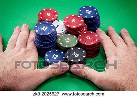 Poker chips and hands above it on green table. View Large Photo Image Stock Photo - Poker chips and hands above it on green table.. Fotosearch