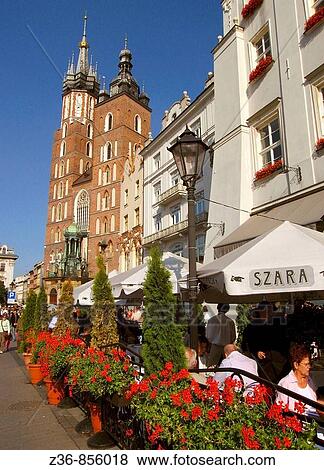 Poland Krakow, Church of St Mary and Szara Building at Main Market Square View Large Photo Image Stock Photo - Poland Krakow, Church of St Mary and Szara Building at Main Market Square. Fotosearch