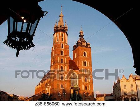 Stock Image - Poland Krakow St Mary's Church at Main Market Square. Fotosearch