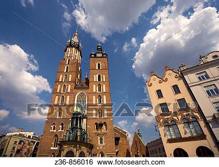 Poland Krakow St Mary's Church with the Art Nouveau Czynciel's House at Main Market Square View Large Photo Image Stock Photograph - Poland Krakow St Mary's Church with the Art Nouveau Czynciel's House at Main Market Square. Fotosearch