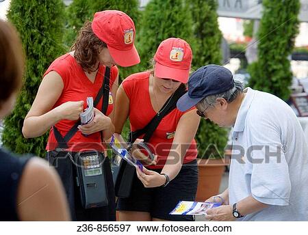 Poland Krakow, Women helping tourist View Large Photo Image Stock Photo - Poland Krakow, Women helping tourist. Fotosearch