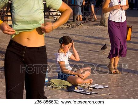 Poland Krakow Young artist at Main Market Square View Large Photo Image Stock Image - Poland Krakow Young artist at Main Market Square. Fotosearch