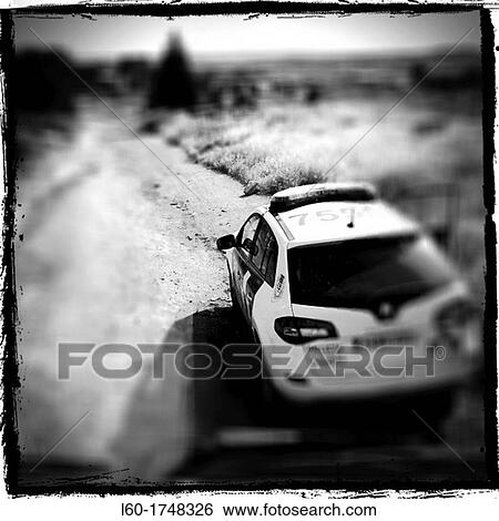 Stock Photograph - Police car on the outskirts of Madrid, Spain. Fotosearch