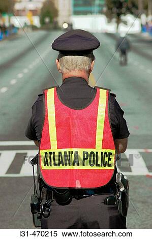 Police officer directing traffic. Atlanta, Georgia. USA. View Large Photo Image Stock Photography - Police officer directing traffic. Atlanta, Georgia. USA.. Fotosearch