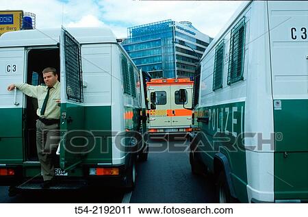 Police vans and ambulances when used before the Potsdamer Platz in Berlin. View Large Photo Image Stock Image - Police vans and ambulances when used before the Potsdamer Platz in Berlin.. Fotosearch