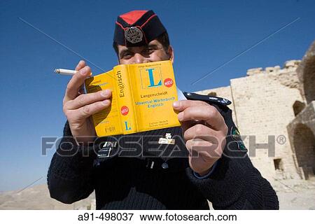 Stock Photo - Policeman learning German. Kerak fortified castle built by French crusaders in 1132. Kerak. Kingdom of Jordan. Fotosearch