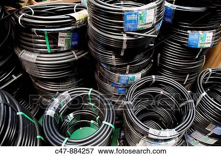 Poly drip watering hose View Large Photo Image Stock Photo - Poly drip watering hose. Fotosearch