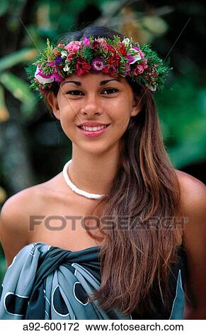 Stock Image - Polynesian woman with head lei. Fotosearch