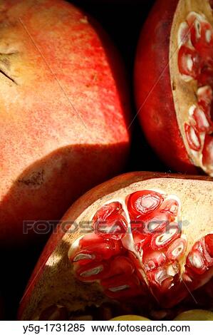pomegranates at greengrocer shop View Large Photo Image Stock Photography - pomegranates at greengrocer shop. Fotosearch