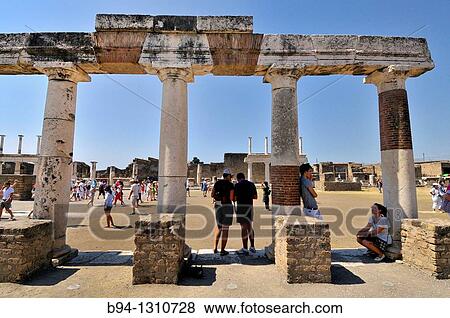 Stock Photo - Pompeii, Roman ruins, the Forum. Roman town buried in AD 79 by ash flows from Vesuvius volcano. UNESCO world heritage site. Province of Naples in Campania. Italy.. Fotosearch