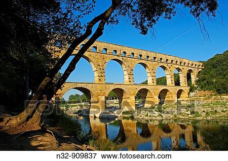 Pont du Gard Roman aqueduct, Gard, Languedoc-Roussillon, France View Large Photo Image Stock Photo - Pont du Gard Roman aqueduct, Gard, Languedoc-Roussillon, France. Fotosearch