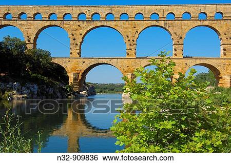Pont du Gard Roman aqueduct, Gard, Languedoc-Roussillon, France View Large Photo Image Stock Photograph - Pont du Gard Roman aqueduct, Gard, Languedoc-Roussillon, France. Fotosearch