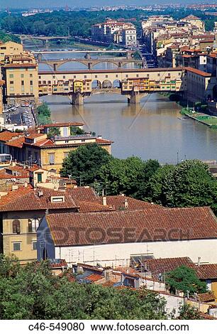 Stock Image - Ponte Vecchio bridge on river Arno, Florence. Tuscany, Italy. Fotosearch