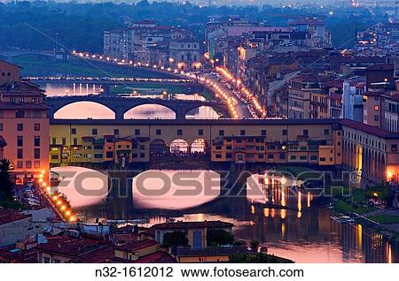 Ponte Vecchio over Arno river at dusk, Florence, Tuscany, Italy View Large Photo Image Stock Image - Ponte Vecchio over Arno river at dusk, Florence, Tuscany, Italy. Fotosearch