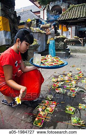 Poojas. Offerings to the Gods near Pasar Ubud, market, Ubud, Bali, Indonesia. View Large Photo Image Stock Photo - Poojas. Offerings to the Gods near Pasar Ubud, market, Ubud, Bali, Indonesia.. Fotosearch