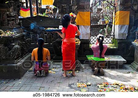 Poojas. Offerings to the Gods near Pasar Ubud, market, Ubud, Bali, Indonesia. View Large Photo Image Stock Photograph - Poojas. Offerings to the Gods near Pasar Ubud, market, Ubud, Bali, Indonesia.. Fotosearch