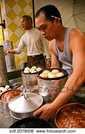 Stock Photograph - Pork Buns at Chengdu Market - Cha siu baau are barbecue pork buns. The buns are filled with barbecue flavoured cha siu pork. They are served as a type of dim sum during yum cha and are often sold in Chinese bakeries.. Fotosearch