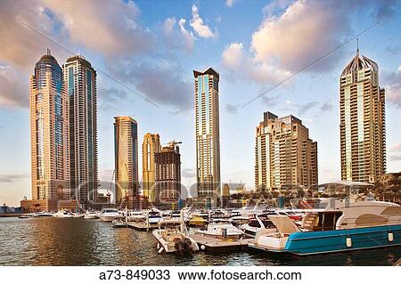 Port and skyscrapers of Dubai Marina, Dubai, United Arab Emirates View Large Photo Image Stock Image - Port and skyscrapers of Dubai Marina, Dubai, United Arab Emirates. Fotosearch