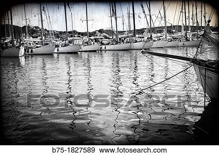 Stock Photo - Port Mahon, Menorca. Balearic Islands, Spain, Mediterranean, vintage boats, sailboats.. Fotosearch