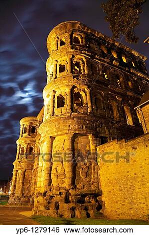 Porta Nigra, illuminated at night, Rhineland-Palatinate, Trier, Germany View Large Photo Image Stock Photograph - Porta Nigra, illuminated at night, Rhineland-Palatinate, Trier, Germany. Fotosearch