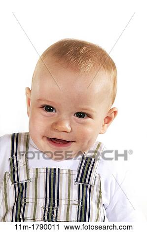 Portait of Baby Boy smiling against white Background View Large Photo Image Stock Image - Portait of Baby Boy smiling against white Background. Fotosearch