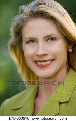 Stock Photograph - portait of smiling woman. Fotosearch