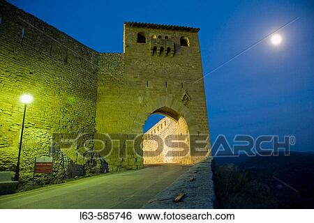 Portal de Sant Mateu and city walls at night. Els Ports. Castell? n province. Valencia. Spain View Large Photo Image Stock Photograph - Portal de Sant Mateu and city walls at night. Els Ports. Castell? n province. Valencia. Spain. Fotosearch