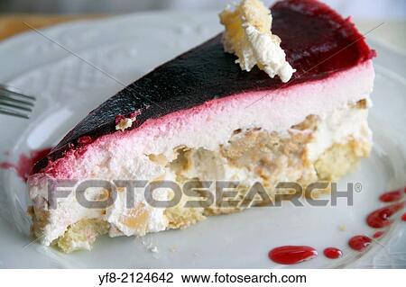Portion of cheese tart with cream on plate. View Large Photo Image Stock Image - Portion of cheese tart with cream on plate.. Fotosearch
