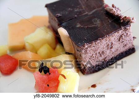 Portion of chocolate tart and fruit. View Large Photo Image Stock Image - Portion of chocolate tart and fruit.. Fotosearch