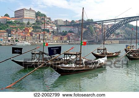 Porto (Portugal). Typical vessels for the transport of barrels on the Douro River from the city of Oporto. View Large Photo Image Stock Photo - Porto (Portugal). Typical vessels for the transport of barrels on the Douro River from the city of Oporto.. Fotosearch